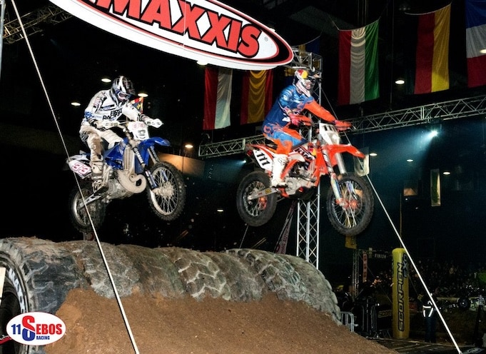 Two motorbike riders in action