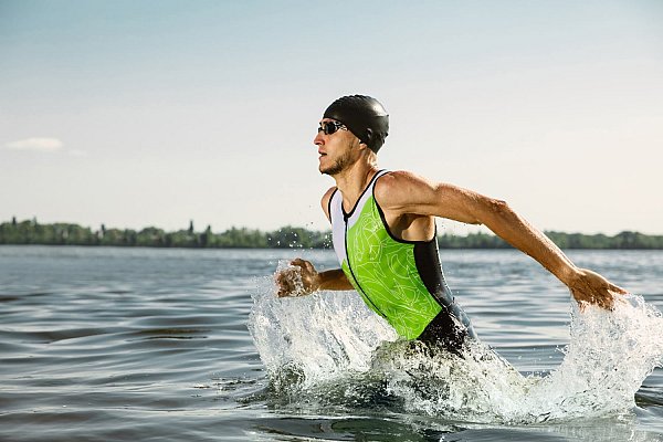 professional-triathlete-swimming-river-s-open-water-man-wearing-swim-equipment-practicing-triathlon-beach-summer-s-day-concept-healthy-lifestyle-sport-action-motion-movement