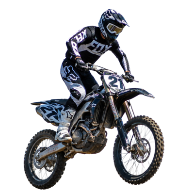supercross rider jumping a triple in a stadium