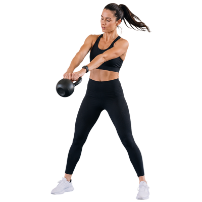 athlete training with dumbbells in a gym