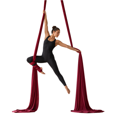 aerialist performing a drop in aerial silks