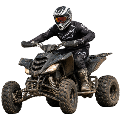 quad rider on a dirt trail