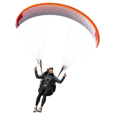 parapentiste en vol au-dessus des montagnes