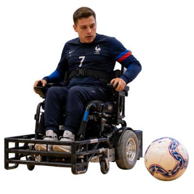 powerchair football players challenging for the ball