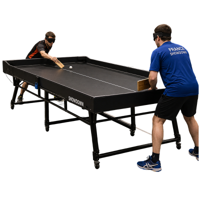 showdown player striking the sound ball on the table