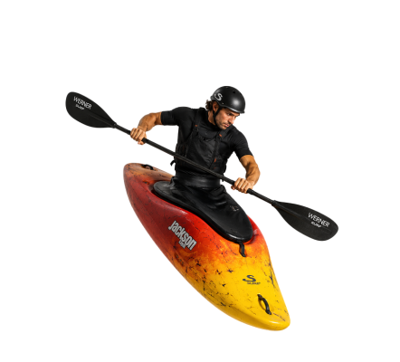 kayaker che surfa un'onda